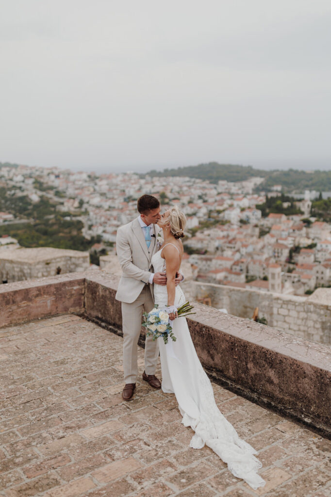 Couple kissing on top of the Spanish fortress, Hvar wedding photographer