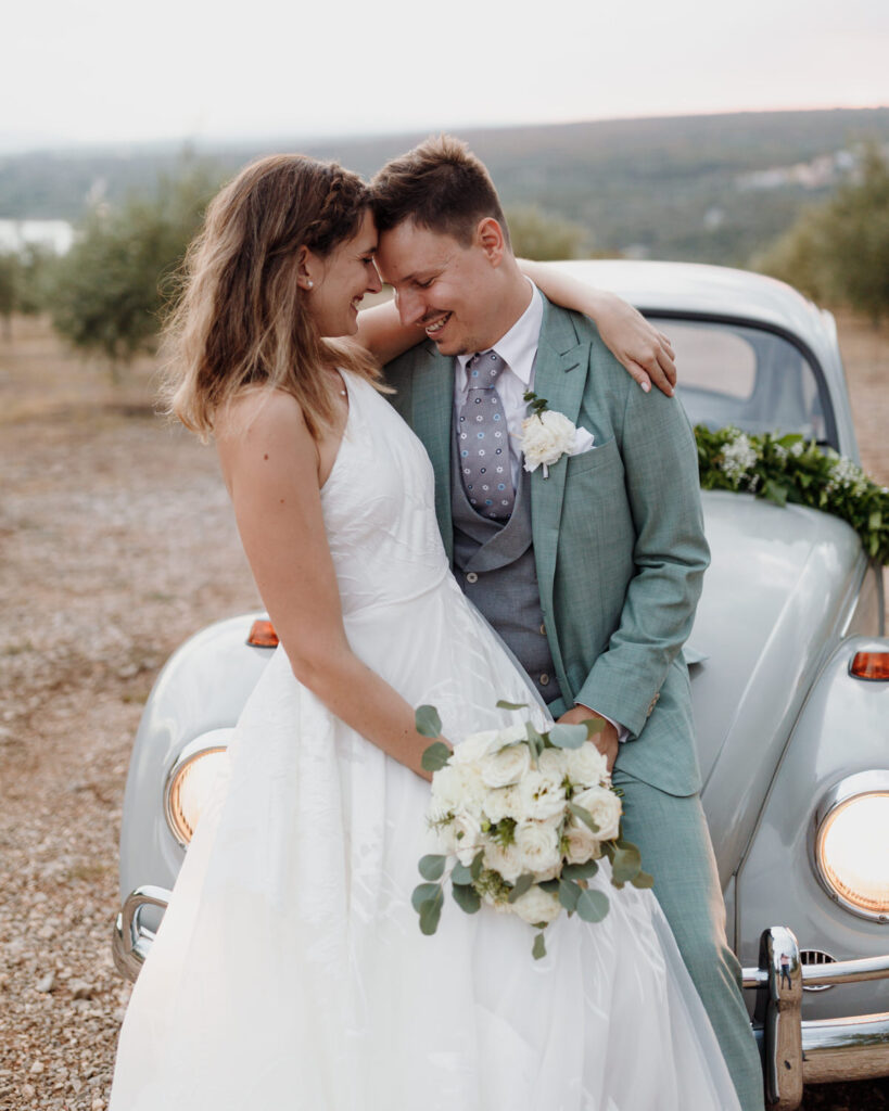 Couple smiling while hugging in Punat, Krk wedding photographer Martin Ivancan