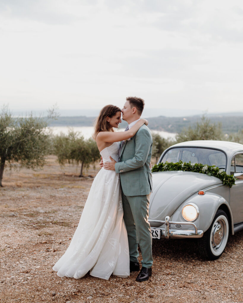 A candid moment shared between bride and groom on their wedding day in Krk by Martin Ivancan - Croatia wedding photographer